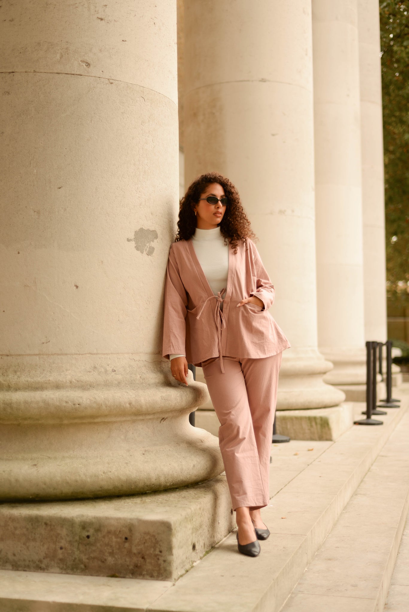 Organic cotton pink suit with cream turtleneck under